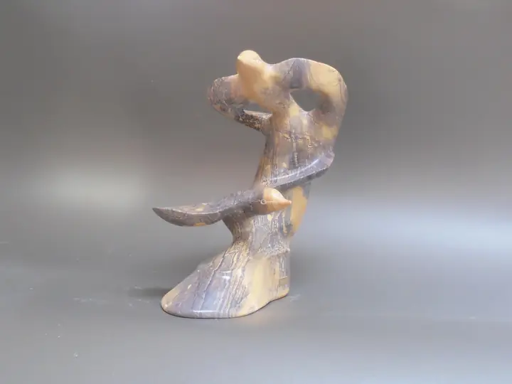 Birds in Flight, stone sculpture by Mel Derzaph