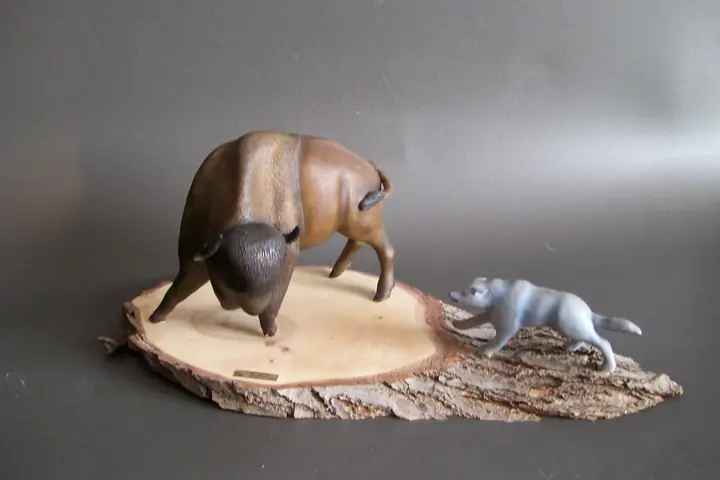 Buffalo, wood sculpture by Mel Derzaph