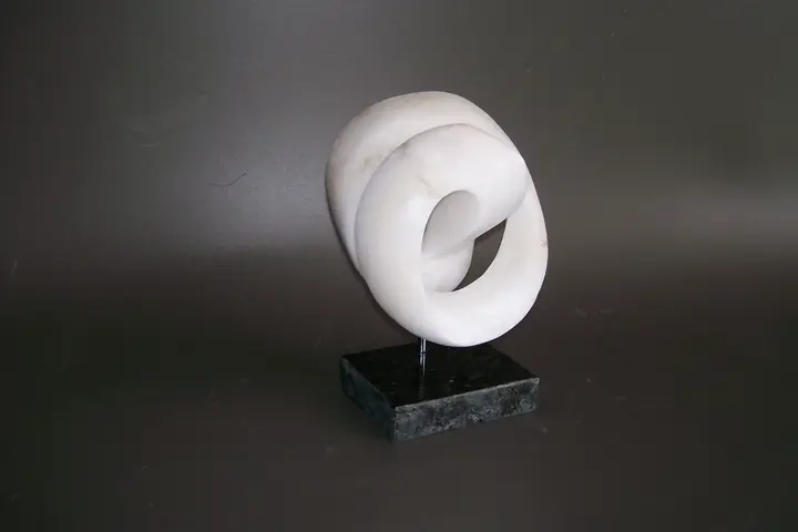 Circle of Life, stone sculpture by Mel Derzaph