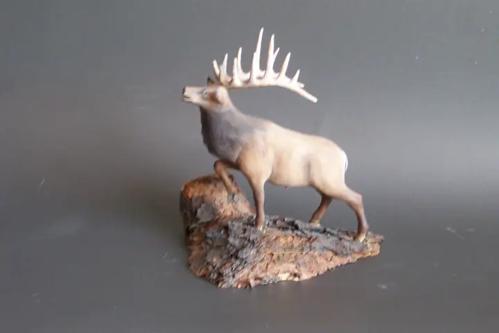 Elk, wood sculpture by Mel Derzaph