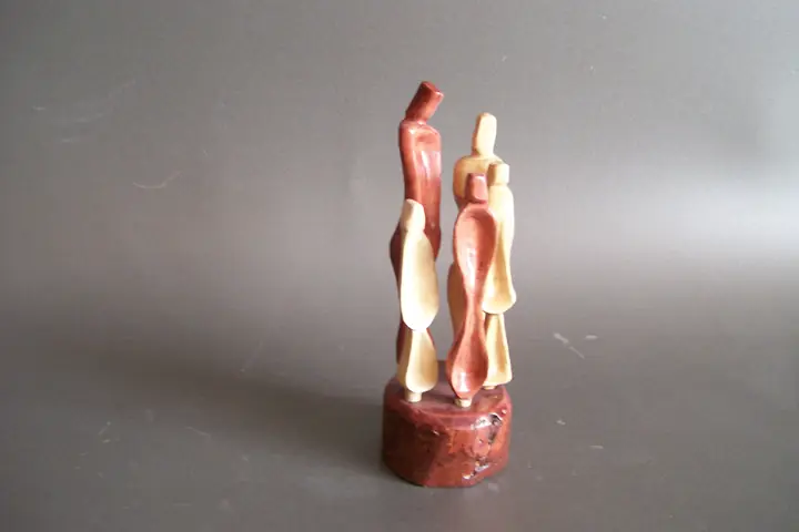 Family, wood sculpture by Mel Derzaph