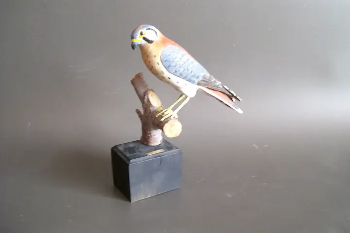 Kestrel, wood sculpture by Mel Derzaph