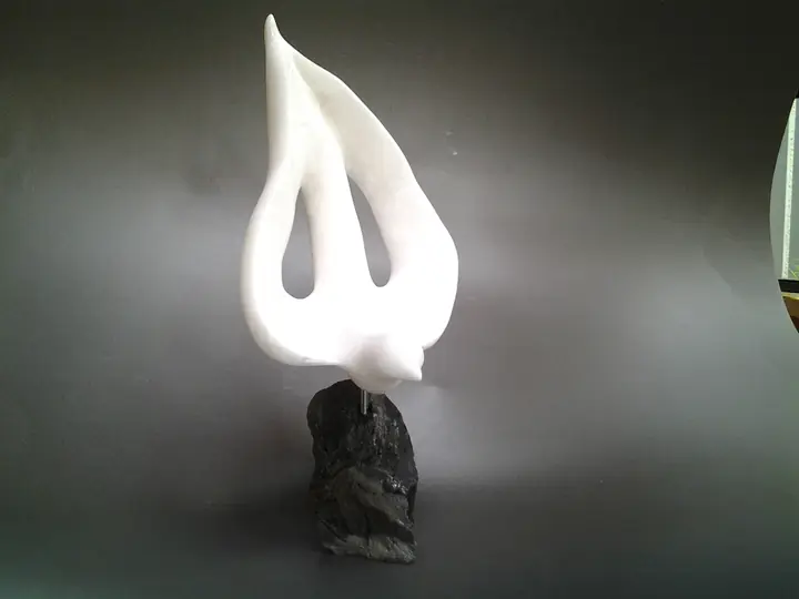 Peace, stone sculpture by Mel Derzaph
